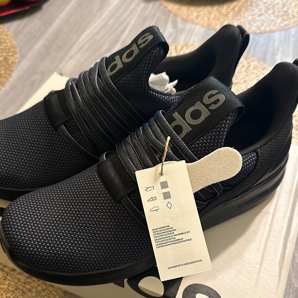 women's shoes
Adidas  Black Sneakers with Streamlined Knit Design